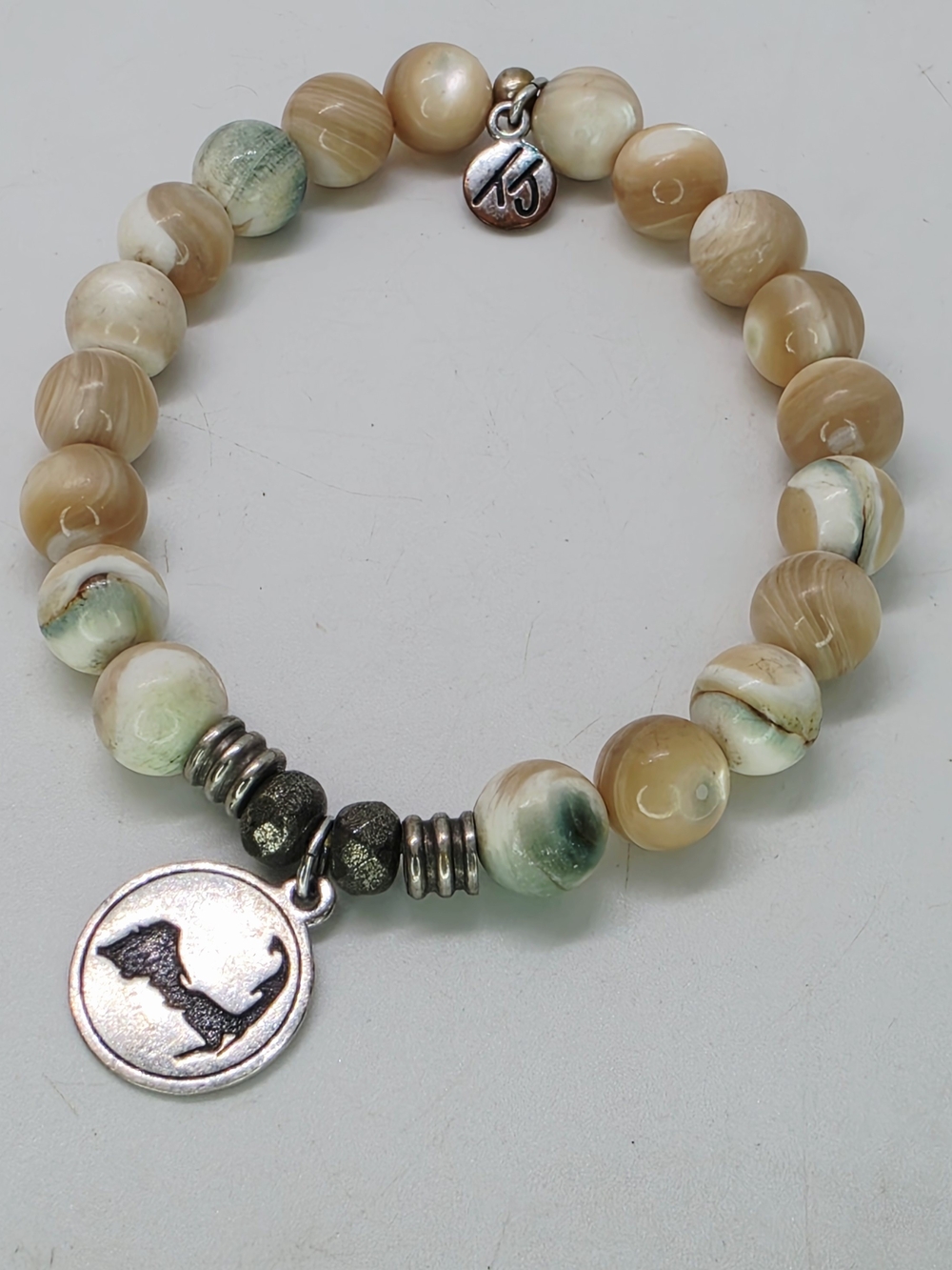 T Jazelle Cape Cod Massachusets Shell Cats Eye High Luster Stretch Bead Bracelet